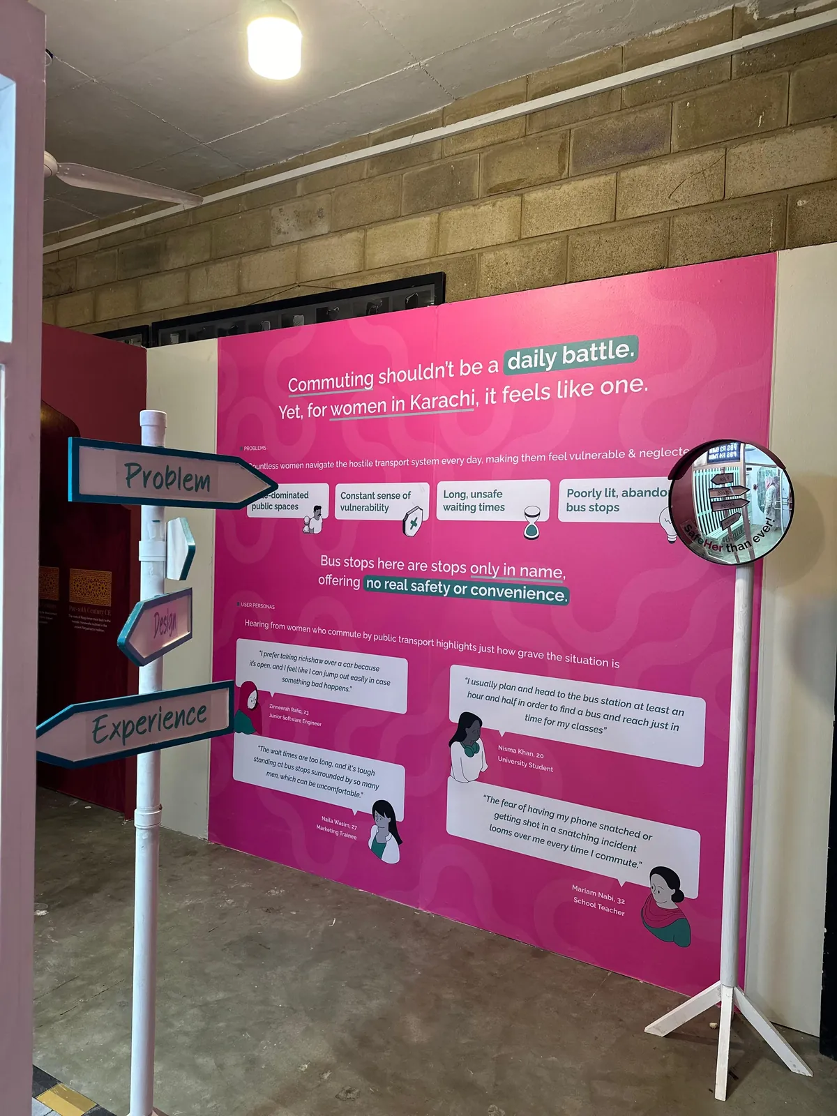 The exhibition wall reading 'Commuting shouldn't be a daily battle. Yet, for women in Karachi, it feels like one.' with the problem framing and user personas.