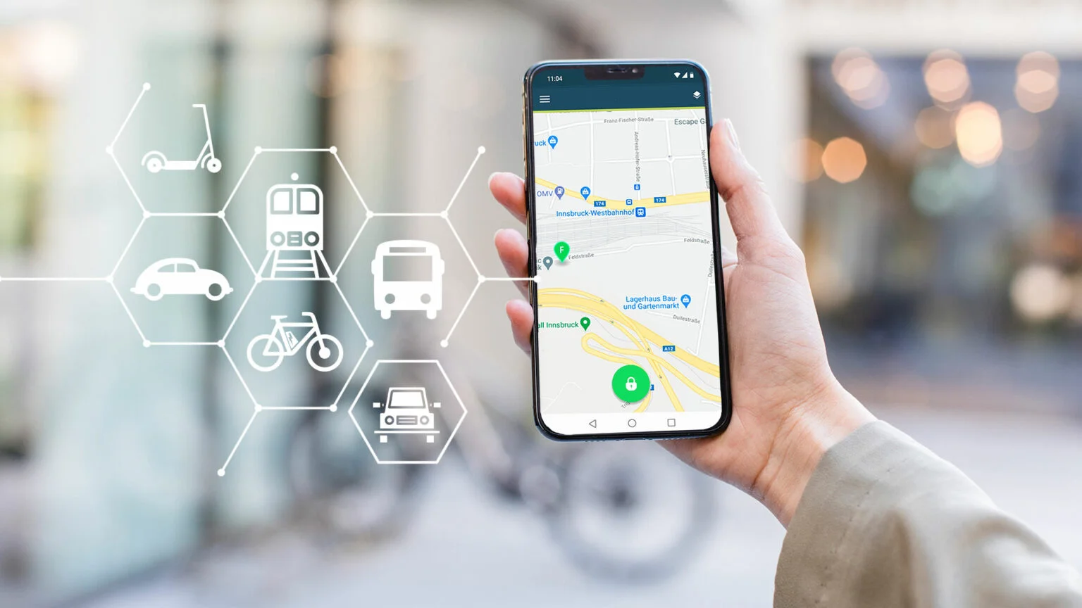 Reference image: a smartphone showing a mobility app map, surrounded by icons for scooter, train, car, bike and bus.